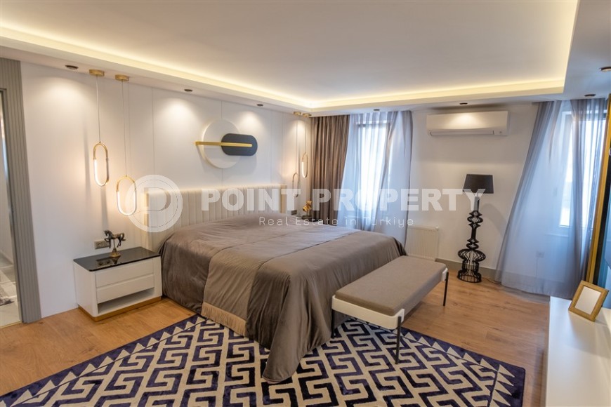 Роскошная двухуровневая квартира на самом берегу Средиземного моря, в престижном районе Анталии - Лара-id-5638-фото-11