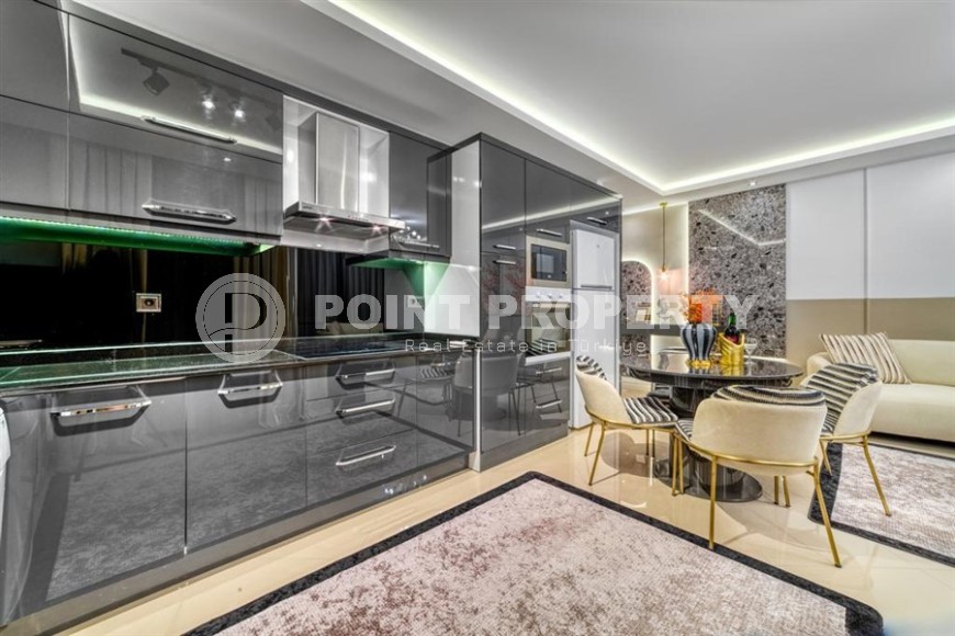 Апартаменты с роскошным дизайнерским ремонтом в центре популярного района Аланьи - Нижняя Оба-id-5644-фото-4