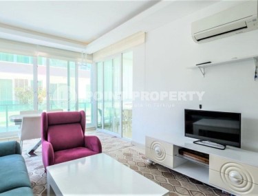 Просторная квартира с одной спальной комнатой в центре спокойного, комфортабельного района Аланьи - Тосмур-id-5647-фото-2