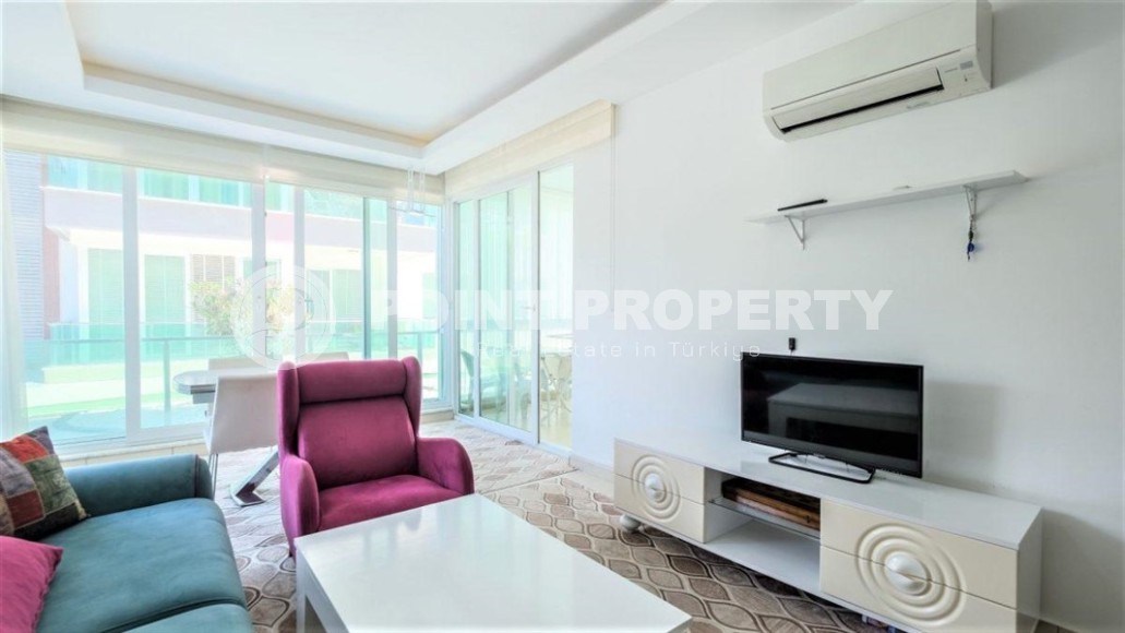 Просторная квартира с одной спальной комнатой в центре спокойного, комфортабельного района Аланьи - Тосмур-id-5647-фото-2