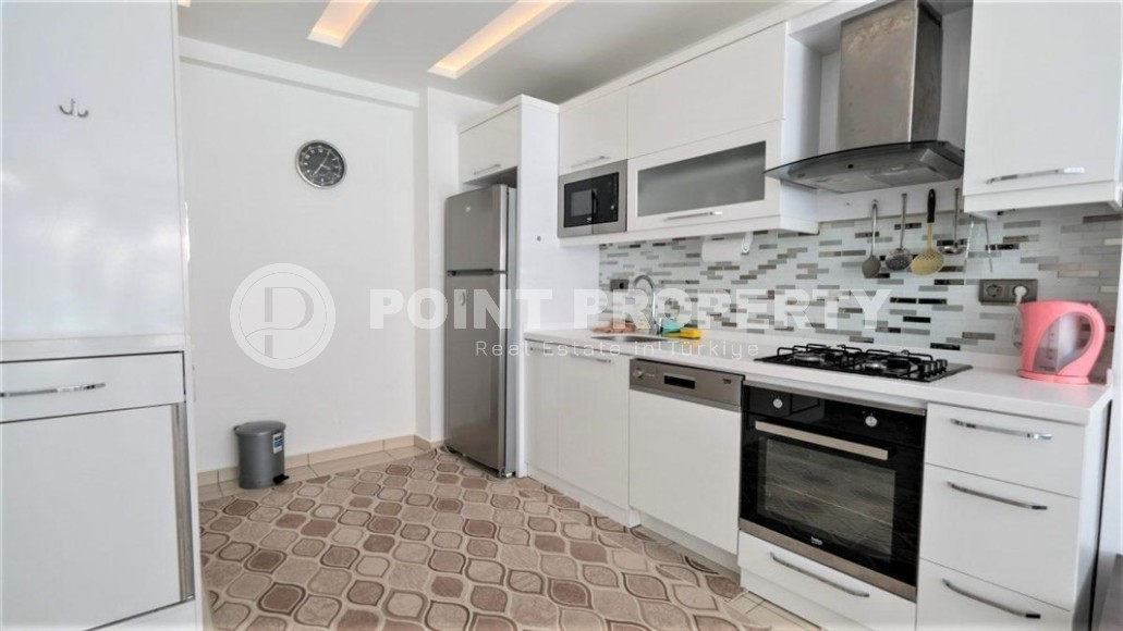 Просторная квартира с одной спальной комнатой в центре спокойного, комфортабельного района Аланьи - Тосмур-id-5647-фото-3