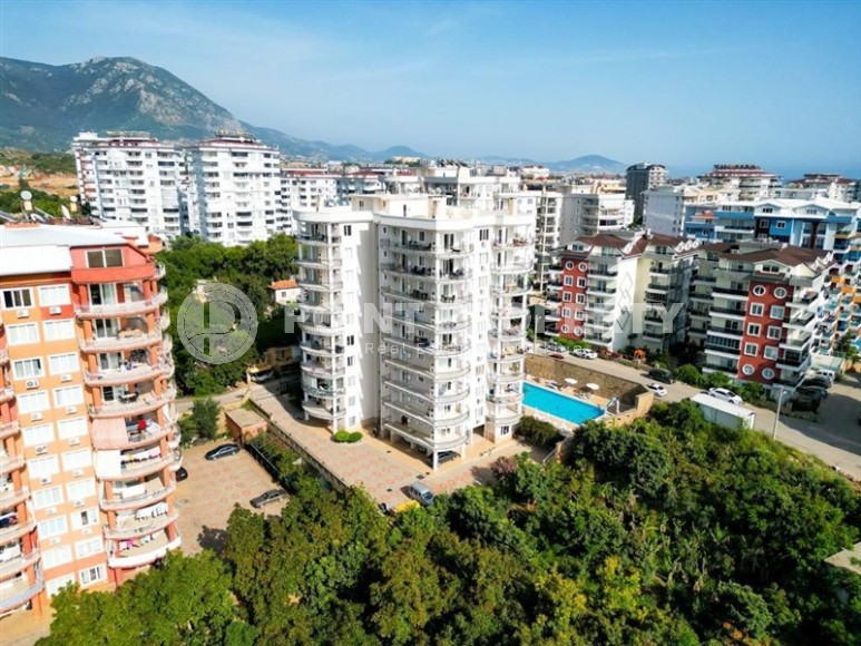 Spacious 2+1 apartment, with a total area of 115 m2, in a landscaped, picturesque area of Alanya - Tosmur-id-5648-photo-7