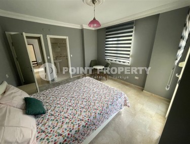 Апартаменты с лаконичным дизайном, всей необходимой мебелью и бытовой техникой, в нескольких минутах ходьбы от центра района Махмутлар-id-5650-фото-5