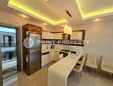 Панорамная квартира с видом на город и Торосские горы, на 9-м этаже в центре района Махмутлар-id-5653-фото-2