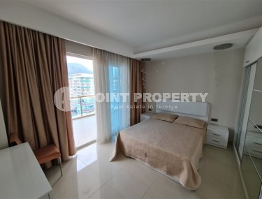 Панорамная квартира с видом на город и Торосские горы, на 9-м этаже в центре района Махмутлар-id-5653-фото-3