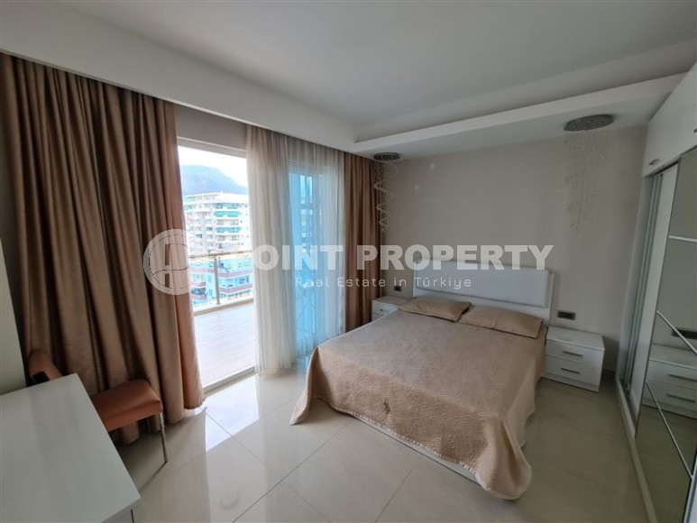 Панорамная квартира с видом на город и Торосские горы, на 9-м этаже в центре района Махмутлар-id-5653-фото-3