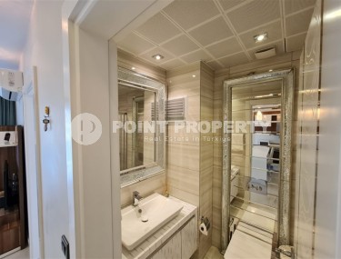 Панорамная квартира с видом на город и Торосские горы, на 9-м этаже в центре района Махмутлар-id-5653-фото-4