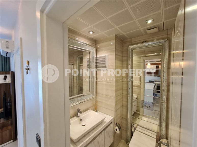 Панорамная квартира с видом на город и Торосские горы, на 9-м этаже в центре района Махмутлар-id-5653-фото-4