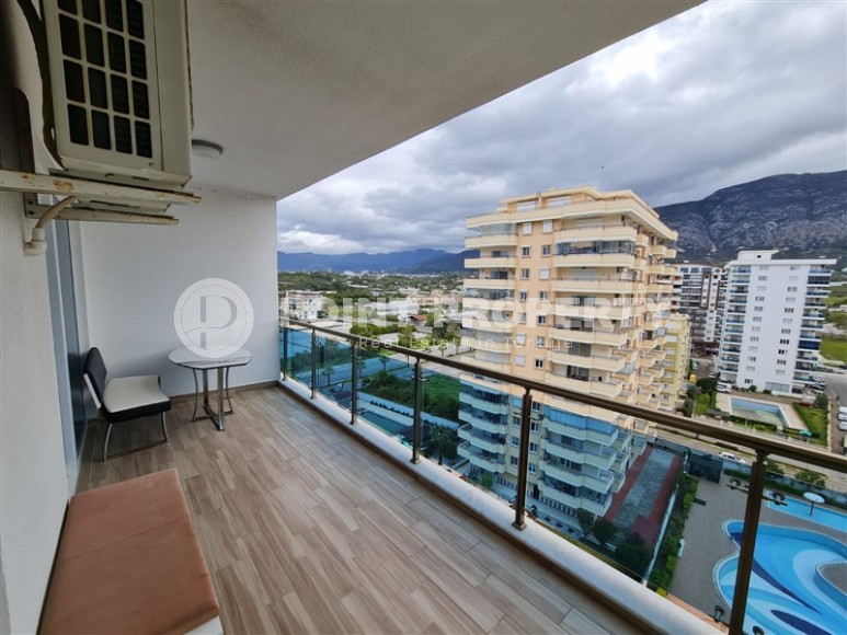 Панорамная квартира с видом на город и Торосские горы, на 9-м этаже в центре района Махмутлар-id-5653-фото-6