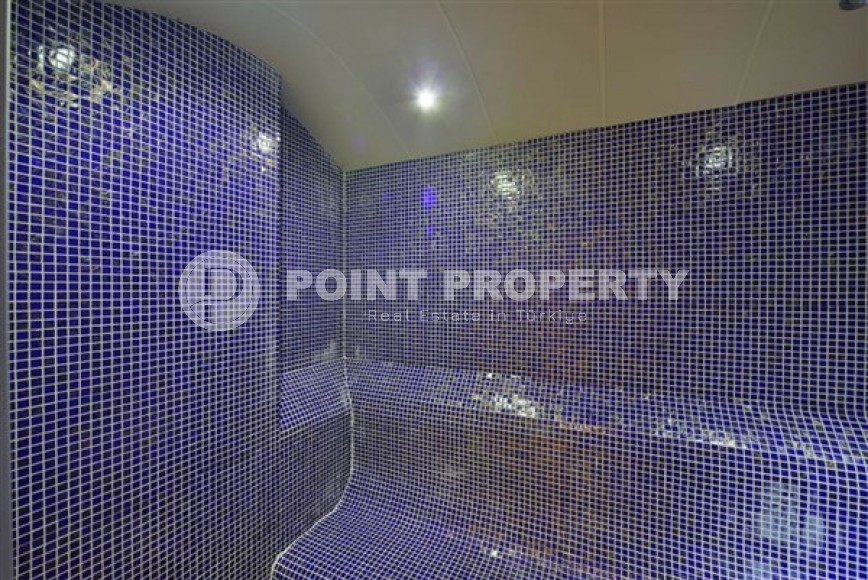 Панорамная квартира с видом на город и Торосские горы, на 9-м этаже в центре района Махмутлар-id-5653-фото-11