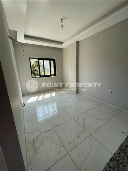 Новая квартира с чистовой отделкой в 800 метрах от моря в спокойном, благоустроенном районе Аланьи - Авсаллар-id-5666-фото-2