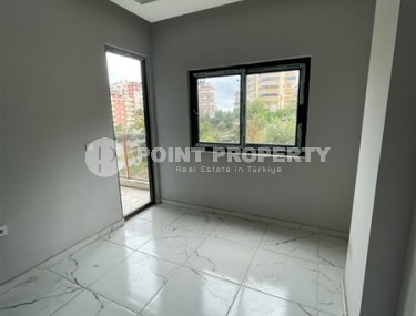 Новая квартира с чистовой отделкой в 800 метрах от моря в спокойном, благоустроенном районе Аланьи - Авсаллар-id-5666-фото-3