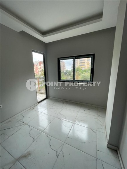 Новая квартира с чистовой отделкой в 800 метрах от моря в спокойном, благоустроенном районе Аланьи - Авсаллар-id-5666-фото-3