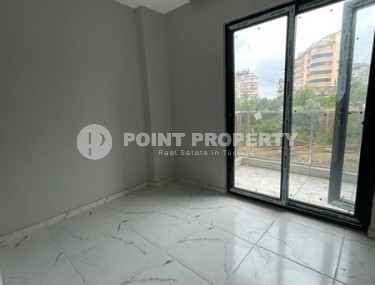 Новая квартира с чистовой отделкой в 800 метрах от моря в спокойном, благоустроенном районе Аланьи - Авсаллар-id-5666-фото-4