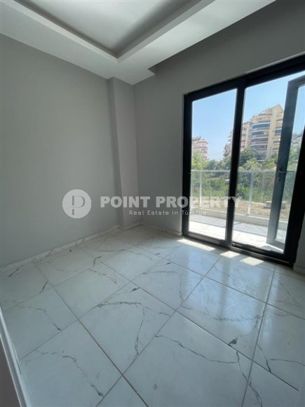 Новая квартира с чистовой отделкой в 800 метрах от моря в спокойном, благоустроенном районе Аланьи - Авсаллар-id-5666-фото-5