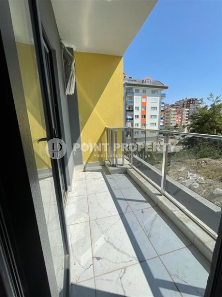 Новая квартира с чистовой отделкой в 800 метрах от моря в спокойном, благоустроенном районе Аланьи - Авсаллар-id-5666-фото-7