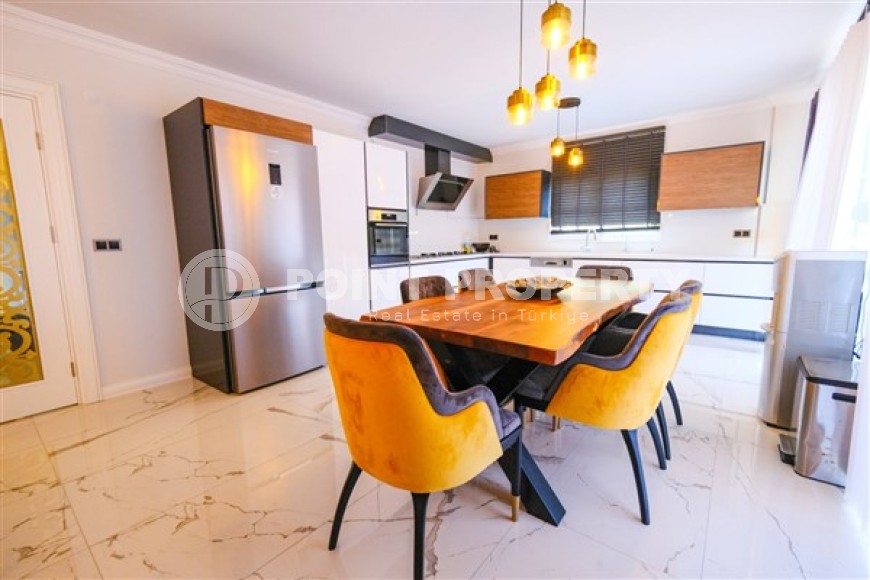 Просторная светлая квартира с современным дизайном, в трех с половиной километрах от моря, в престижном районе Аланьи - Бекташ-id-5668-фото-2