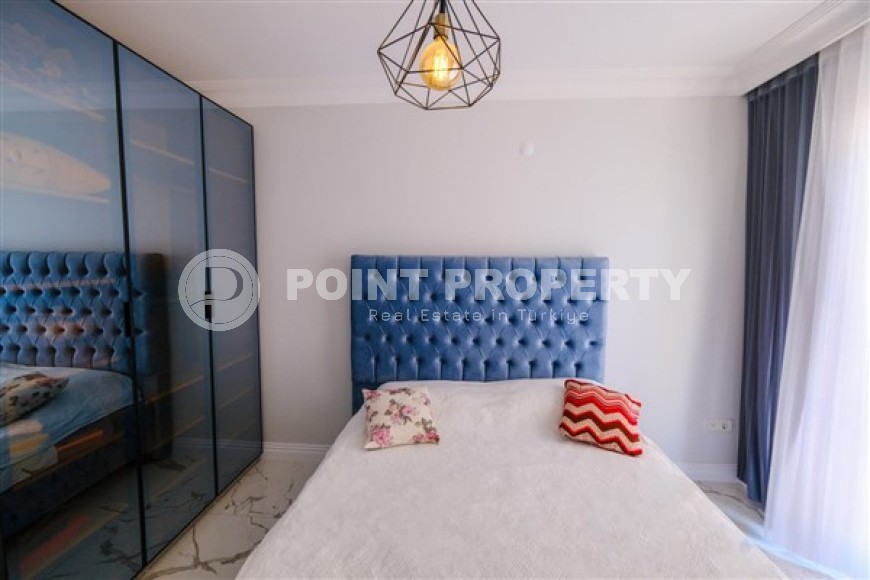 Просторная светлая квартира с современным дизайном, в трех с половиной километрах от моря, в престижном районе Аланьи - Бекташ-id-5668-фото-4