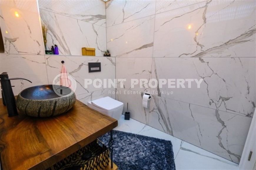 Просторная светлая квартира с современным дизайном, в трех с половиной километрах от моря, в престижном районе Аланьи - Бекташ-id-5668-фото-11