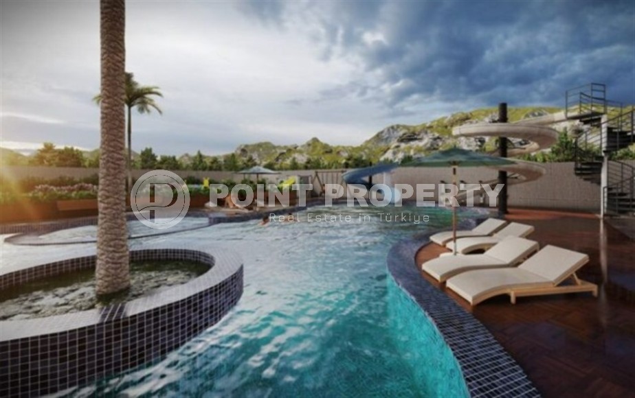 Небольшая квартира на 4-м этаже в жилом комплексе на финальном этапе строительства, в центре современного района Аланьи - Махмутлар-id-5684-фото-5