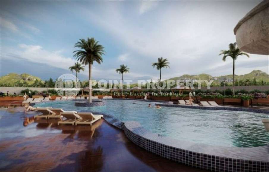 Небольшая квартира на 4-м этаже в жилом комплексе на финальном этапе строительства, в центре современного района Аланьи - Махмутлар-id-5684-фото-6