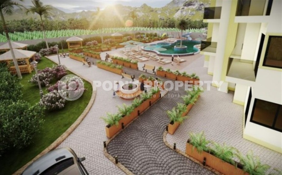 Небольшая квартира на 4-м этаже в жилом комплексе на финальном этапе строительства, в центре современного района Аланьи - Махмутлар-id-5684-фото-7