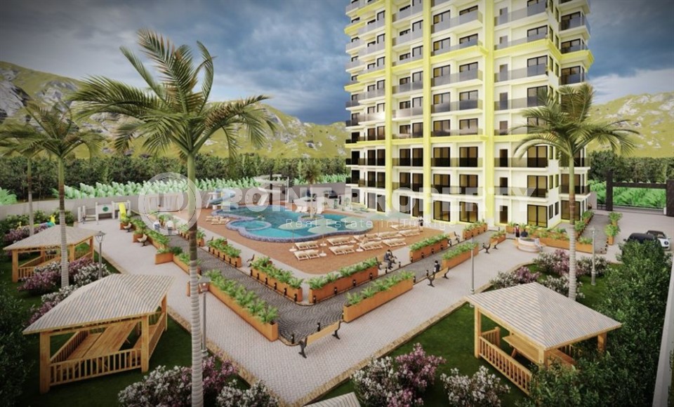 Небольшая квартира на 4-м этаже в жилом комплексе на финальном этапе строительства, в центре современного района Аланьи - Махмутлар-id-5684-фото-9