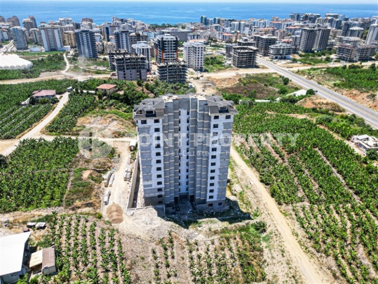 Небольшая квартира на 4-м этаже в жилом комплексе на финальном этапе строительства, в центре современного района Аланьи - Махмутлар-id-5684-фото-11