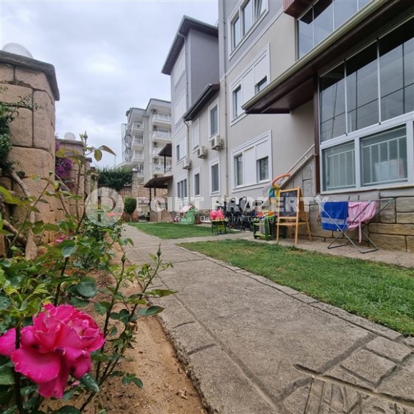 Большая двухуровневая квартира с собственным садом, в центре спокойного, благоустроенного района Аланьи - Джикджилли-id-5690-фото-17