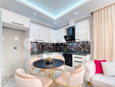 Stylish apartment with designer renovation 300 meters from the sea, in the center of the popular area of Alanya - Mahmutlar-id-5692-photo-4