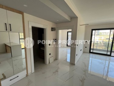 Небольшая квартира 1+1, общей площадью 50 м2, в перспективном, благоустроенном районе Аланьи - Авсаллар-id-5703-фото-4