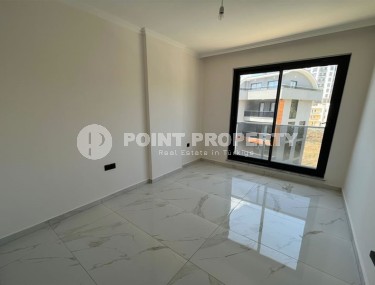 Небольшая квартира 1+1, общей площадью 50 м2, в перспективном, благоустроенном районе Аланьи - Авсаллар-id-5703-фото-5