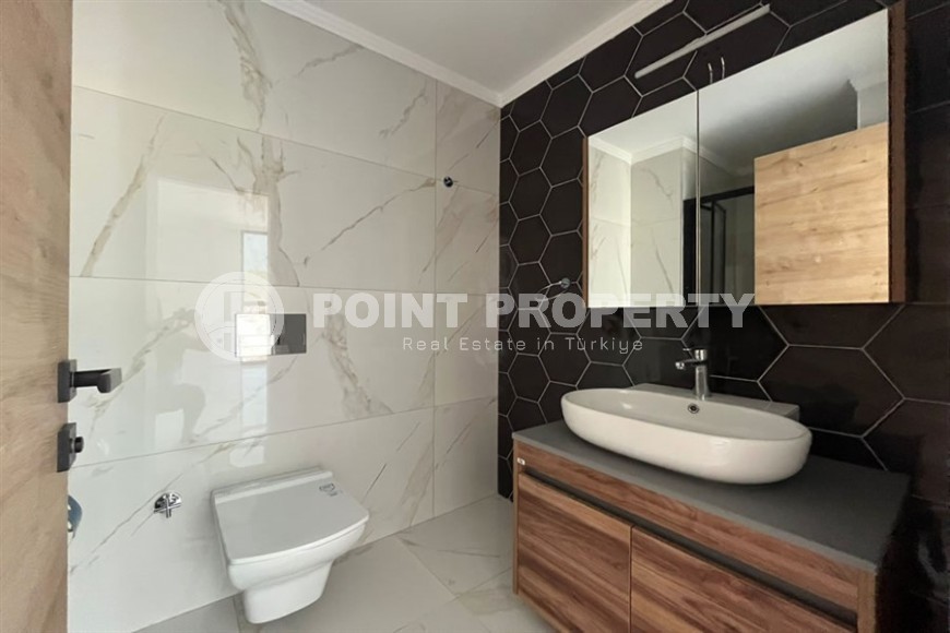 Небольшая квартира 1+1, общей площадью 50 м2, в перспективном, благоустроенном районе Аланьи - Авсаллар-id-5703-фото-6