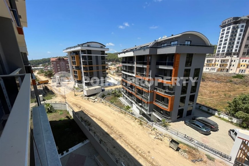 Небольшая квартира 1+1, общей площадью 50 м2, в перспективном, благоустроенном районе Аланьи - Авсаллар-id-5703-фото-8