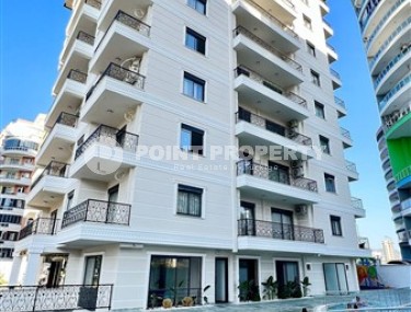 Small apartment 1+1, with a total area of 55 m2, 750 meters from the sea, in the center of Mahmutlar-id-5707-photo-1