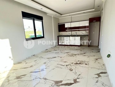 Small apartment 1+1, with a total area of 55 m2, 750 meters from the sea, in the center of Mahmutlar-id-5707-photo-2