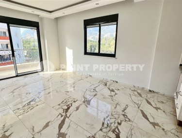 Small apartment 1+1, with a total area of 55 m2, 750 meters from the sea, in the center of Mahmutlar-id-5707-photo-3