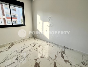 Small apartment 1+1, with a total area of 55 m2, 750 meters from the sea, in the center of Mahmutlar-id-5707-photo-4