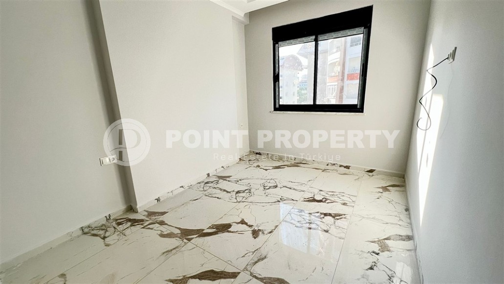 Небольшие апартаменты 1+1, общей площадью 55 м2, в 750 метрах от моря, в центре района Махмутлар-id-5707-фото-5