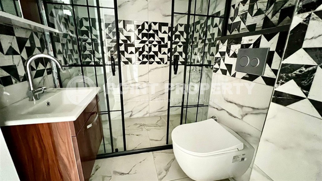 Небольшие апартаменты 1+1, общей площадью 55 м2, в 750 метрах от моря, в центре района Махмутлар-id-5707-фото-7