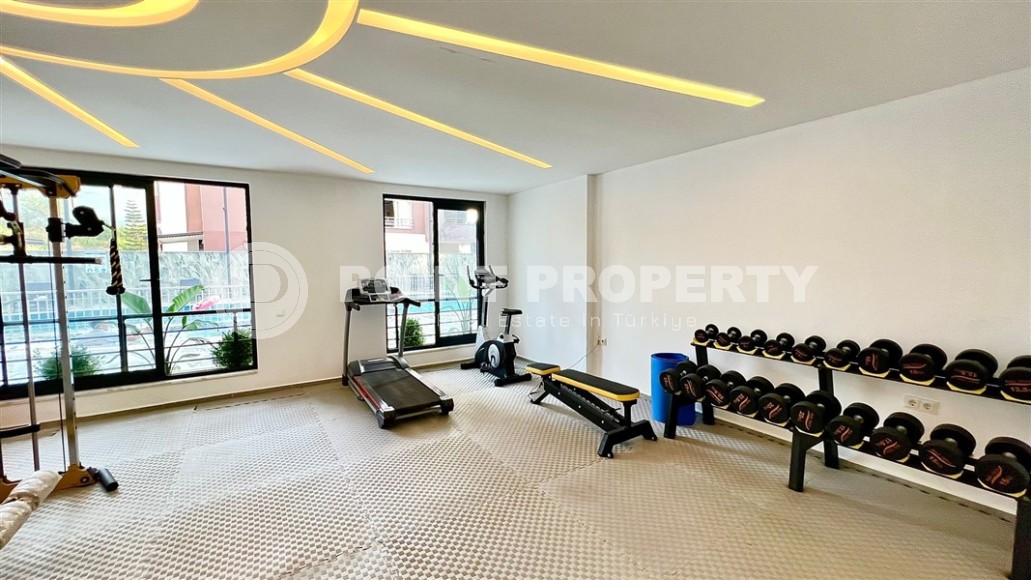 Небольшие апартаменты 1+1, общей площадью 55 м2, в 750 метрах от моря, в центре района Махмутлар-id-5707-фото-10