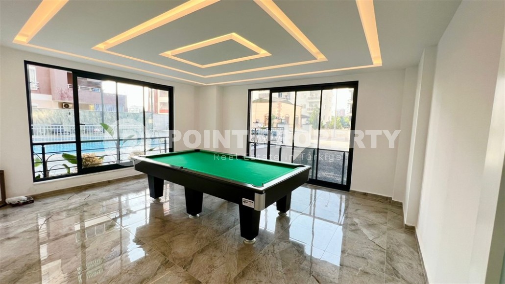 Небольшие апартаменты 1+1, общей площадью 55 м2, в 750 метрах от моря, в центре района Махмутлар-id-5707-фото-15