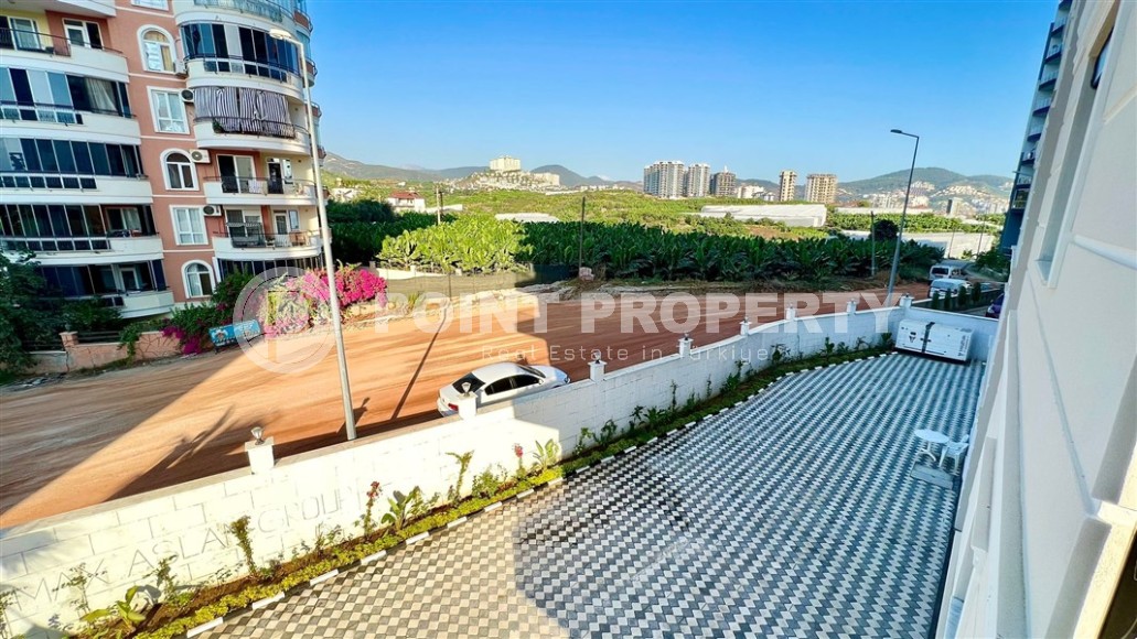 Небольшие апартаменты 1+1, общей площадью 55 м2, в 750 метрах от моря, в центре района Махмутлар-id-5707-фото-17