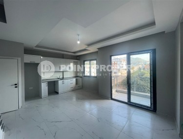 Новая квартира с чистовой отделкой в 1300 метрах от моря, в популярном районе Аланьи - Оба-id-5716-фото-2