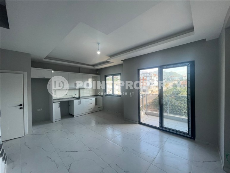 Новая квартира с чистовой отделкой в 1300 метрах от моря, в популярном районе Аланьи - Оба-id-5716-фото-2