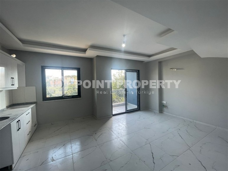 Новая квартира с чистовой отделкой в 1300 метрах от моря, в популярном районе Аланьи - Оба-id-5716-фото-3