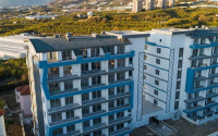 Apartment 1+1, 55m², in an elite complex in Mahmutlar, Alanya, at an attractive price.-id-1450-photo-2
