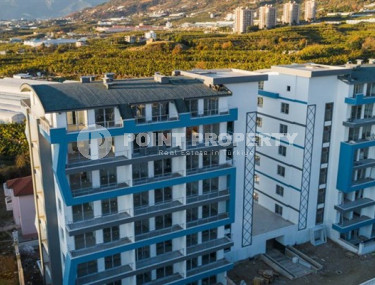 Apartment 1+1, 55m², in an elite complex in Mahmutlar, Alanya, at an attractive price.-id-1450-photo-2