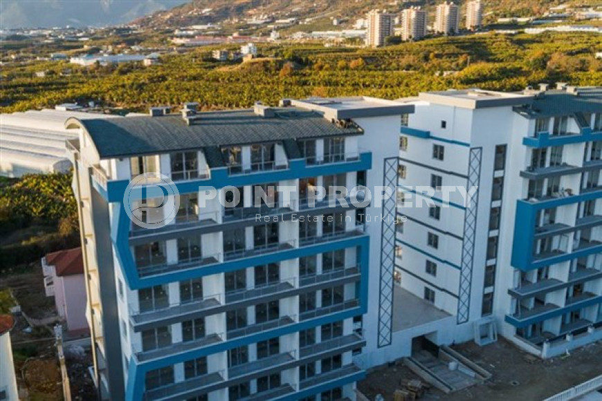 Apartment 1+1, 55m², in an elite complex in Mahmutlar, Alanya, at an attractive price.-id-1450-photo-2