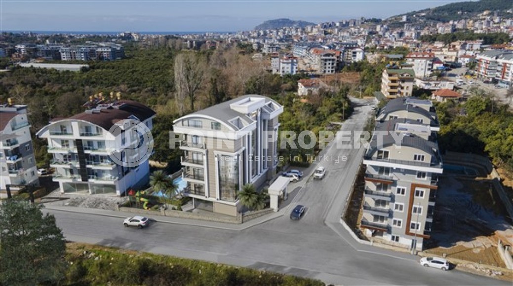 Apartments of different layouts, 45-210m², in Upper Oba, Alanya, in a residence with good infrastructure-id-2542-photo-4